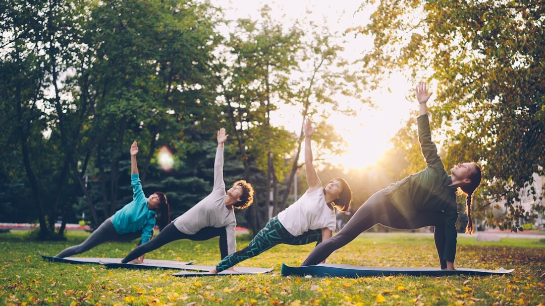 seniors doing yoga outdoors
