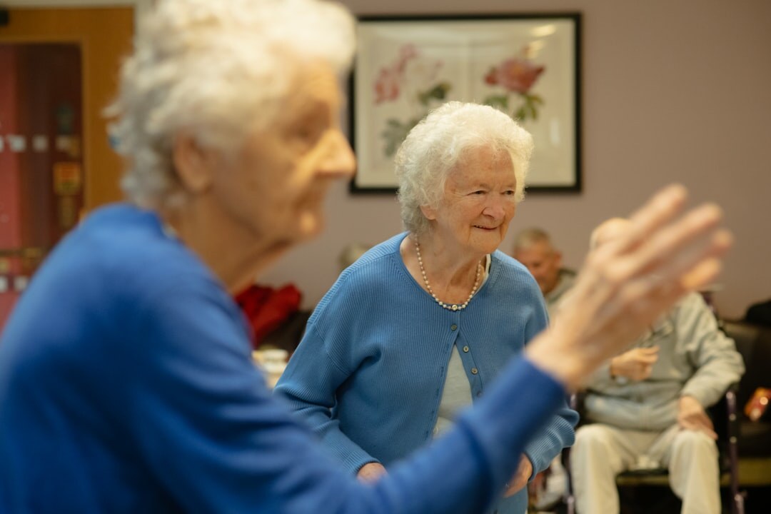 seniors playing cards indoors
